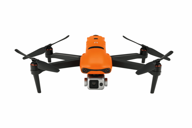 Front-facing view of orange professional drone used by Monster Video Productions